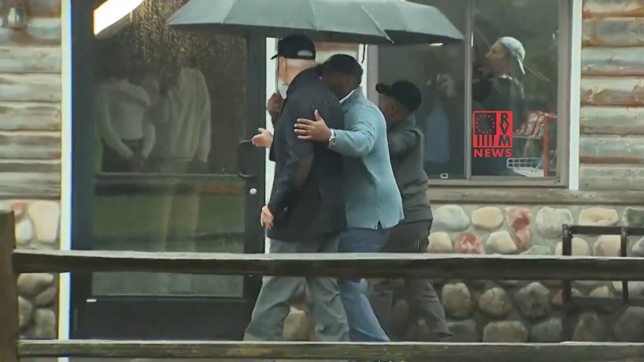National Embarrassment Joe Biden Lost In The Rain, Handler Shows Him The Way [VIDEO]