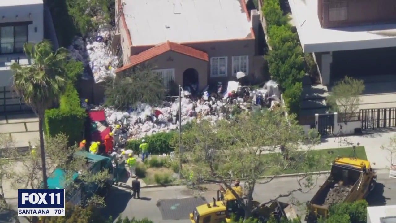 Crews work to clear ‘trash house’ in Fairfax District [Video]