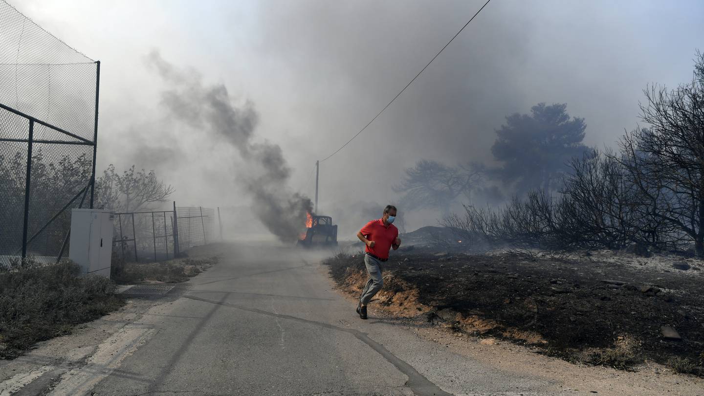 Drop in winds offers hope as firefighters battle huge wildfire on fringes of Athens. 1 person dead  Boston 25 News [Video]