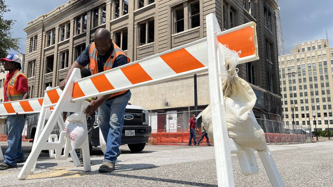 Barricades removed from streets near gutted Gilbert Building [Video]