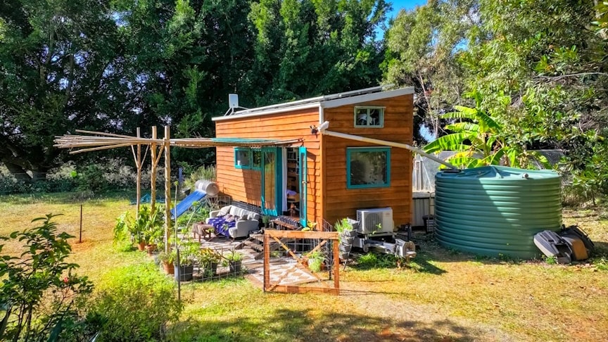 Couple Lives 7 Years Off-Grid in Their DIY Tiny Homestead [Video]