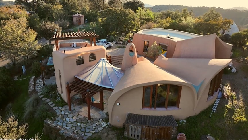 Couple Built Magical Hobbit Village In Rural Mountaintop [Video]