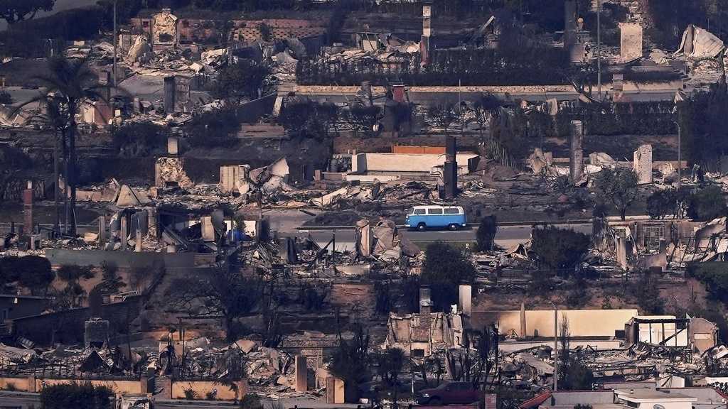 A retro blue VW van miraculously survives deadly Los Angeles fire [Video]